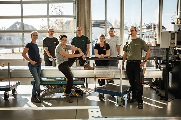 Mitarbeiterrinnen und Mitarbeiter als Gruppenfoto